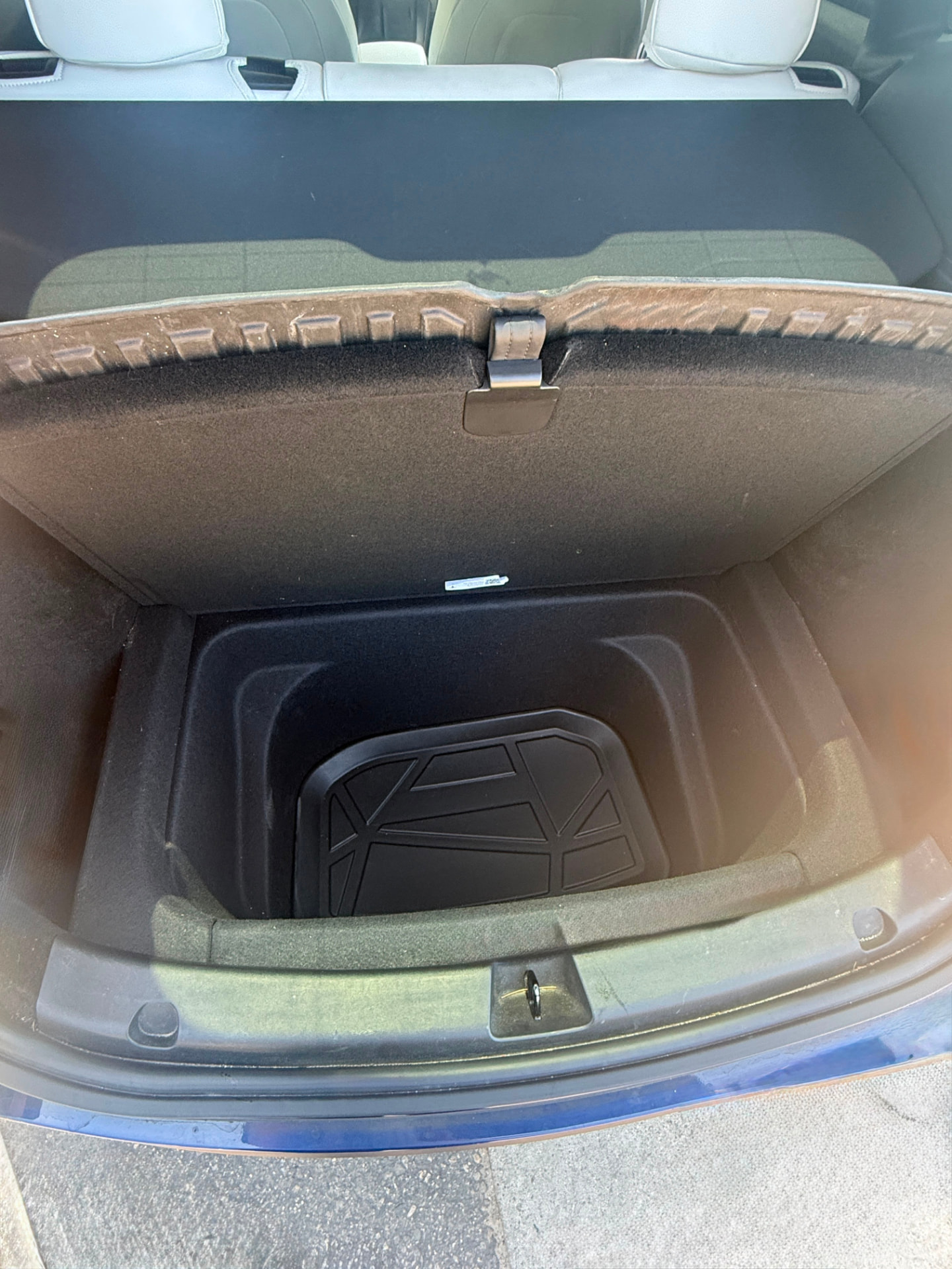 Under-floor luggage storage in the Tesla trunk